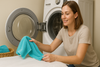 An image of a woman washing microfiber towels & cloths