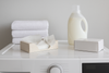 An image of dryer sheets and fabric softner