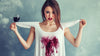 An image with a person with wine stained clothes