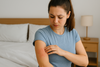 An image of a woman getting hives from laundry detergent 