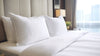 An image of a bed with a duvet cover on it