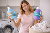 A woman undecided on what to use from antibacterial or Antimicrobial.
