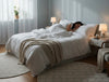 A woman is having good sleep on the bed.
