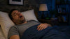 A man sleeping with his mouth open.