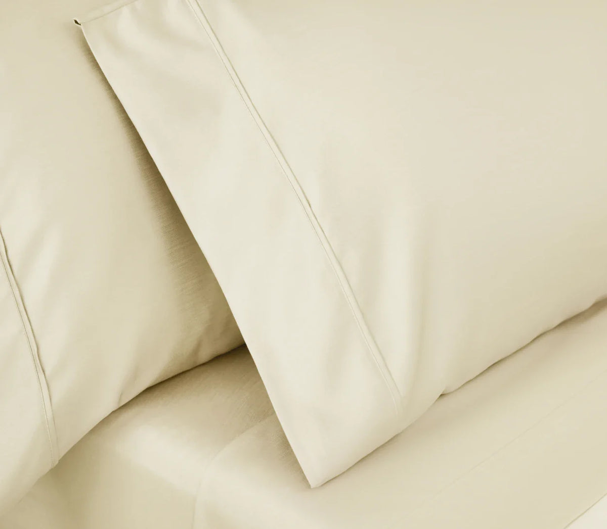 An image of some pillows with pillowcases on them