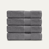 Stack of gray towels on a white background