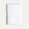White towel on a light beige background