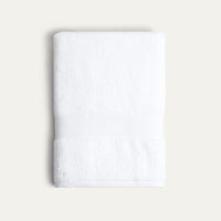White towel on a light beige background