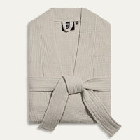 Light gray textured robe with a belt on a white background