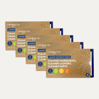 Multiple packages of Miracle Made laundry detergent sheets on a light gray background