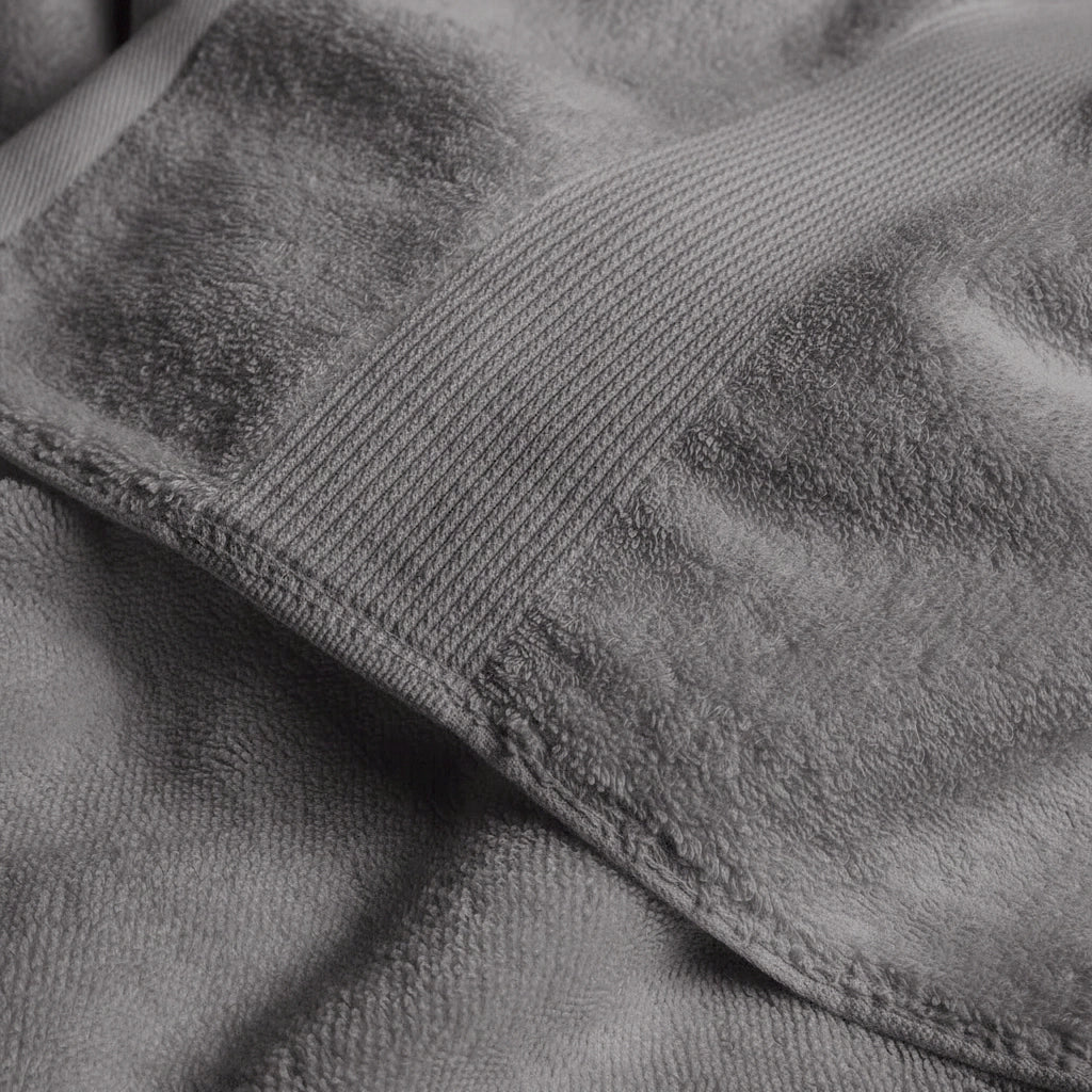 Close-up of gray textured fabric with a focus on texture and color.