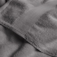 Close-up of gray textured fabric with a focus on texture and color.
