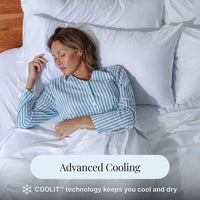 Woman sleeping in a bed with white bedding and pillows, featuring text about COOLIT technology.