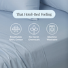 Gray bedding with features labeled: breathable 100% cotton, no harsh chemicals, machine washable.