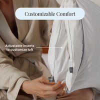 Person adjusting a pillow with customizable comfort text overlay