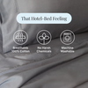 Gray bedding with icons and text highlighting features like breathable 100% cotton, no harsh chemicals, and machine washable.